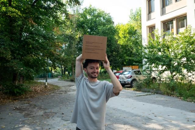Performer Robert Popa interacting with a module from Lorena Cocora's work. Photo credit: Alexandra Costea