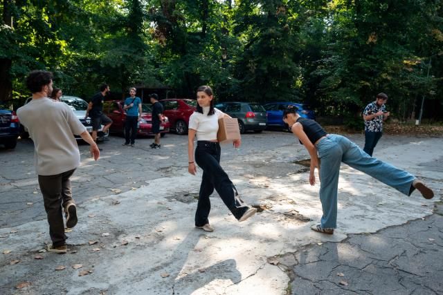 Performers Robert Popa (left), Bianca Adelina Geantă (middle) and Ada Anghel (right) improvising during a site-specific performative intervention. Photo credit: Alexandra Costea